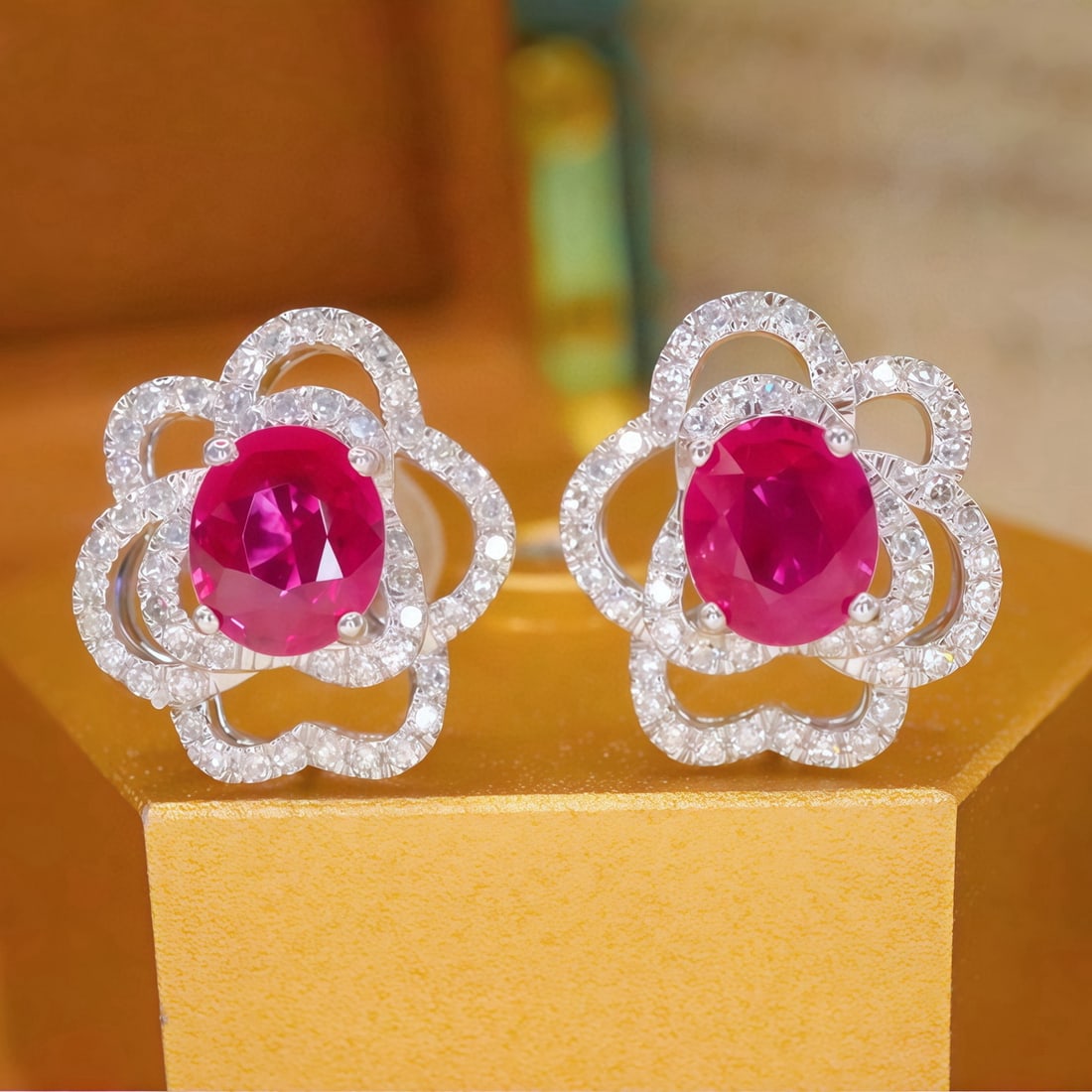 14k Gold 1.35 Ctw Natural Ruby & Diamond Earrings: Ref:231080027 // gold content:14k gold // main gemstone:ruby // shape:oval // carat weight:1. 05ct // color:red // treatment:natural // // adjacent gemstone 2 : diamond // number of stones:100 // shap