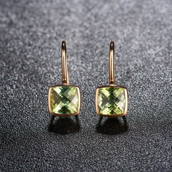 14k Gold 3.2 Ct Natural Tourmaline Earrings: Ref:231080051 // gold content:14k gold // main gemstone:tourmaline // shape:cushion // carat weight:3. 2ct // color:green // treatment:natural // Low Estimate: 2600 Condition: New High Estimate: 4000