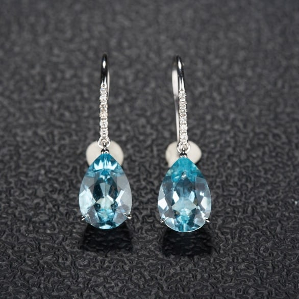 14k Gold 3.06 Ct Natural Aquamarine & Diamond Earrings: Ref:231080057 // gold content:14k gold // main gemstone:aquamarine // shape:pear // carat weight:3. 06ct // color:santa maria color // treatment:natural // // adjacent gemstone 2 : diamond //