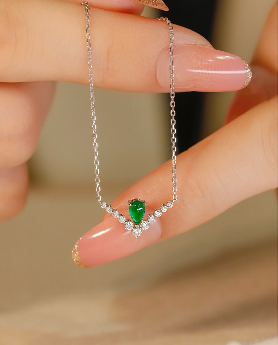 14k Gold 0.33 Ctw Vivid Green Natural Emerald & Diamond Necklace: Ref:231080102 // gold content:14k gold // main gemstone:emerald // shape:pear // carat weight:0. 2ct // color:vivid green // treatment:natural // // adjacent gemstone 2 : diamond // shape:round // car