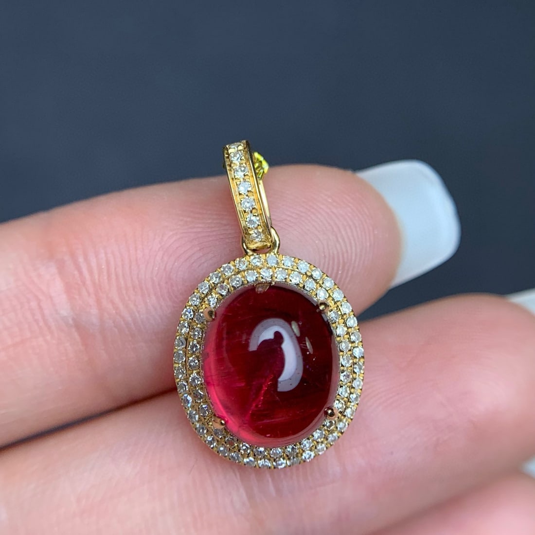 14k Gold 4.75 Ct Natural Tourmaline & Diamond Pendant( Without Chain ): Ref:231080127 // gold content:14k gold // main gemstone:tourmaline // shape:oval // carat weight:4. 75ct // color:red // treatment:natural // // adjacent gemstone 2 : diamond // number of stones:79