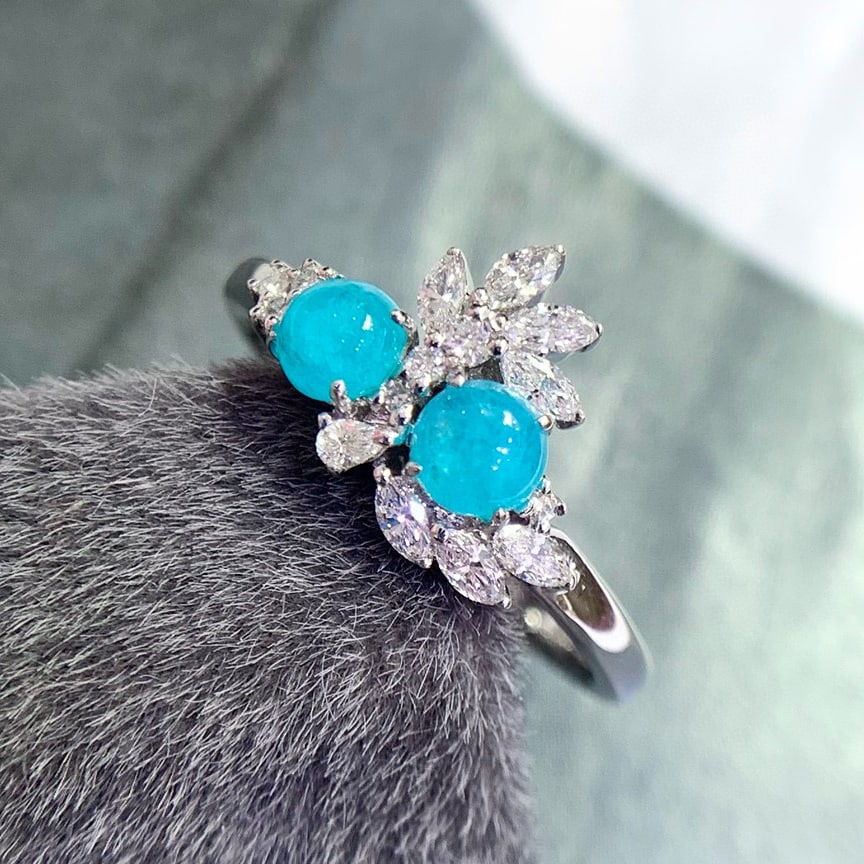 14k Gold 0.93 Ctw Natural Paraiba Tourmaline & Diamond Ring: Ref:231080133 // gold content:14k gold // ring size:7. 25us // // main gemstone:paraiba tourmaline // shape:round // carat weight:0. 56ct // color:blue // treatment:natural // cut grade:g // //
