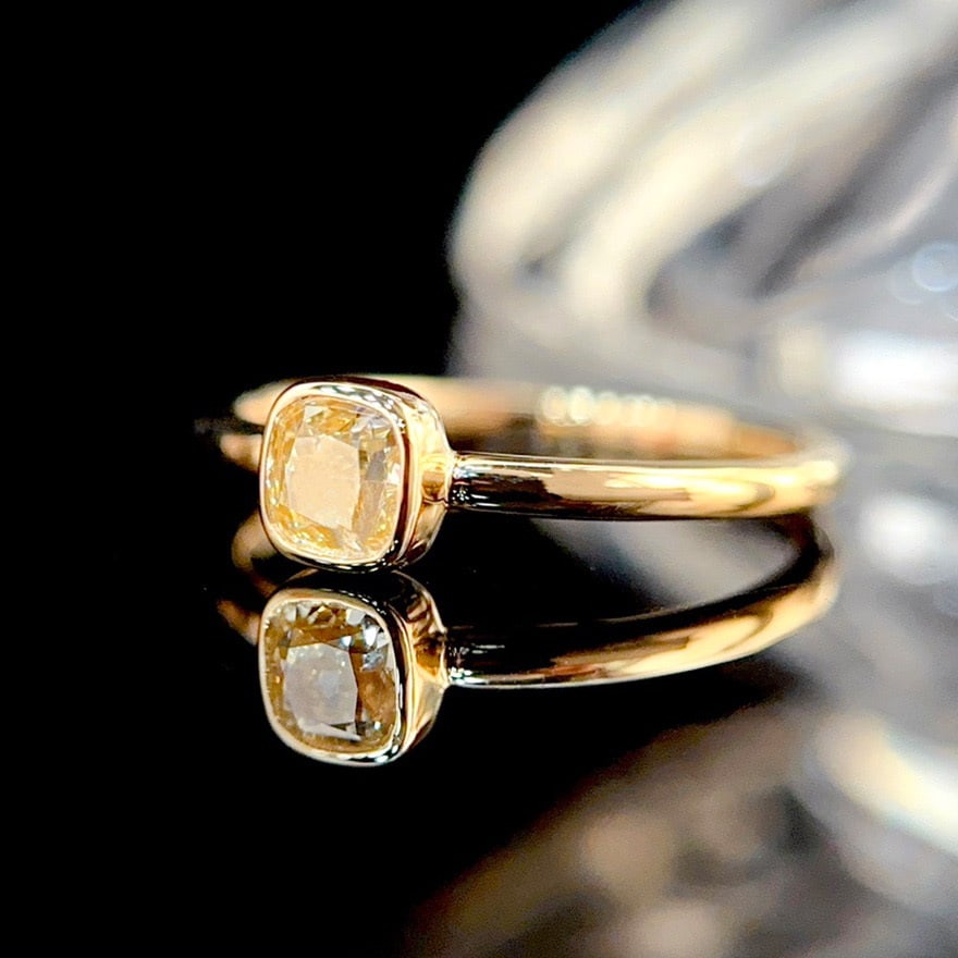 14k Gold 0.42 Ct Natural Yellow Diamond Ring: Ref:231080151 // gold content:14k gold // ring size:7. 25us // // main gemstone:yellow diamond // shape:cushion // carat weight:0. 42ct // color:yellow // treatment:natural // High Estimate: 6600 Low