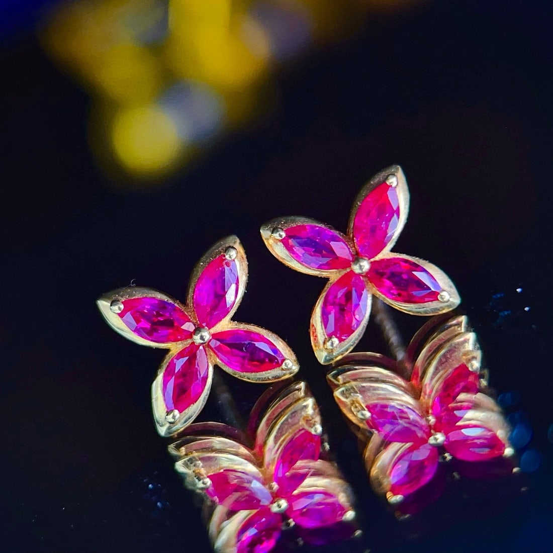 14k Gold 1.4 Ct Natural Ruby Earrings: Ref:231080209 // gold content:14k gold // main gemstone:ruby // shape:marquise // carat weight:1. 4ct // color:red // treatment:natural // Low Estimate: 2600 Condition: New High Estimate: 4000