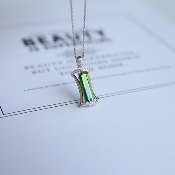 14k Gold 1.35 Ct Natural Tourmaline & Diamond Pendant( Without Chain ): Ref:231080239 // gold content:14k gold // main gemstone:tourmaline // shape:octagonal // carat weight:1. 35ct // color:green // treatment:natural // // adjacent gemstone 2 : diamond // shape:round //