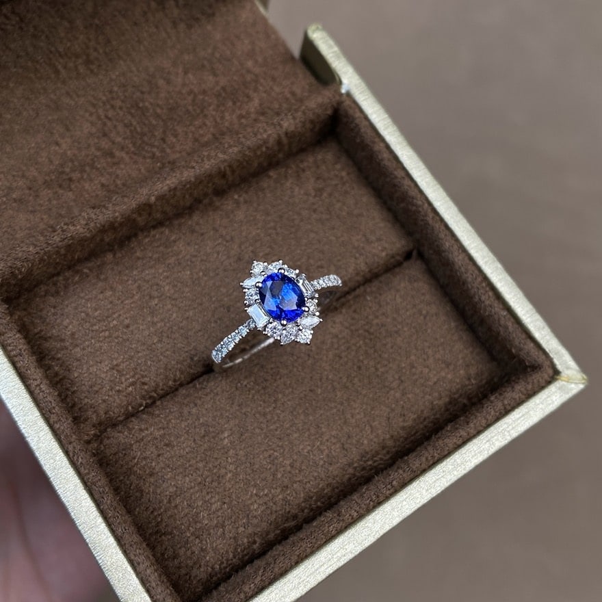 14k Gold 1.15 Ctw Natural Sapphire & Diamond Ring: Ref:231080254 // gold content:14k gold // ring size:7. 25us // // main gemstone:sapphire // shape:oval // carat weight:0. 7ct // color:royal blue // treatment:natural // // adjacent gemstone 2 :
