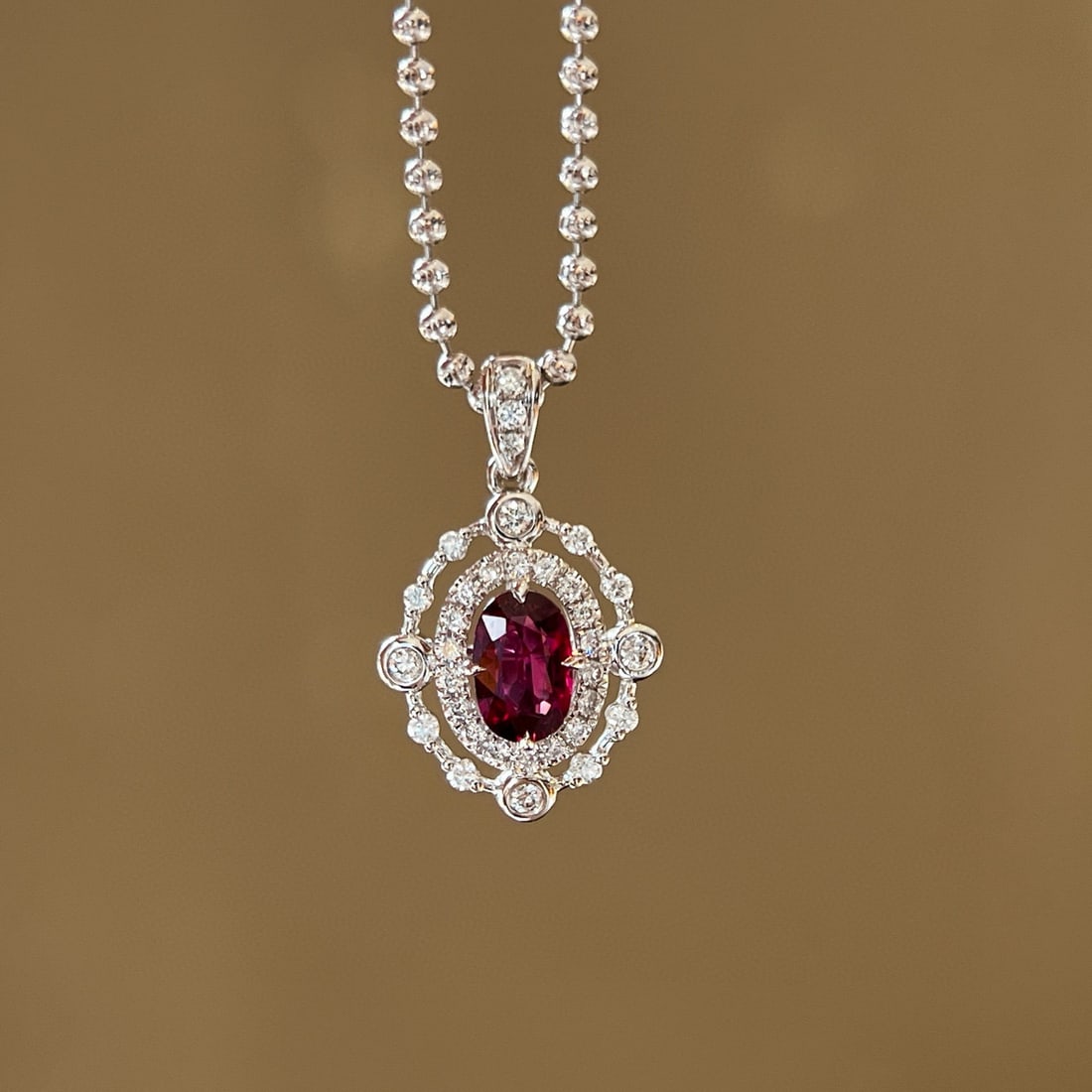 14k Gold 0.68 Ctw Natural Ruby & Diamond Pendant( Without Chain ): Ref:231080376 // gold content:14k gold // main gemstone:ruby // shape:oval // carat weight:0. 49ct // color:red // treatment:natural // // adjacent gemstone 2 : diamond // shape:round // carat weight: