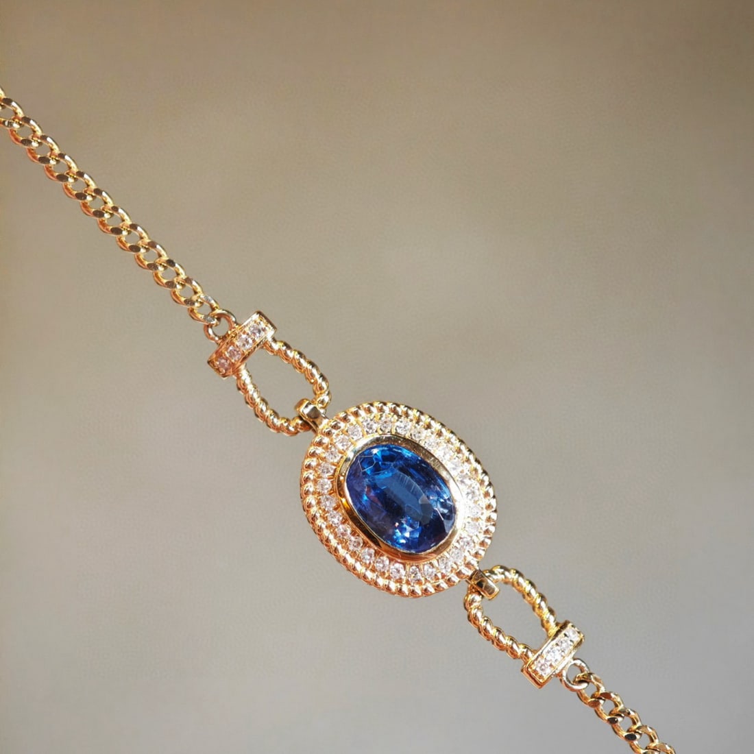 14k Gold 1 Ct Natural Sapphire & Diamond Bracelet: Ref:231080411 // gold content:14k gold // main gemstone:sapphire // shape:oval // carat weight:1ct // color:blue // treatment:natural // // adjacent gemstone 2 : diamond // shape:round // clarity grad