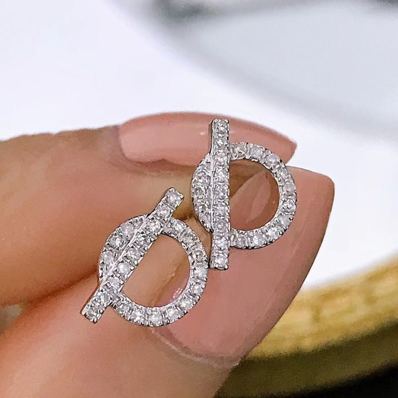 14k Gold 0.24 Ct Natural H Diamond Earrings: Ref:231080415 // gold content:14k gold // main gemstone:diamond // shape:round // carat weight:0. 24ct // clarity grade:vs-si // color:h // treatment:natural // cut grade:g // Low Estimate: 1400 High