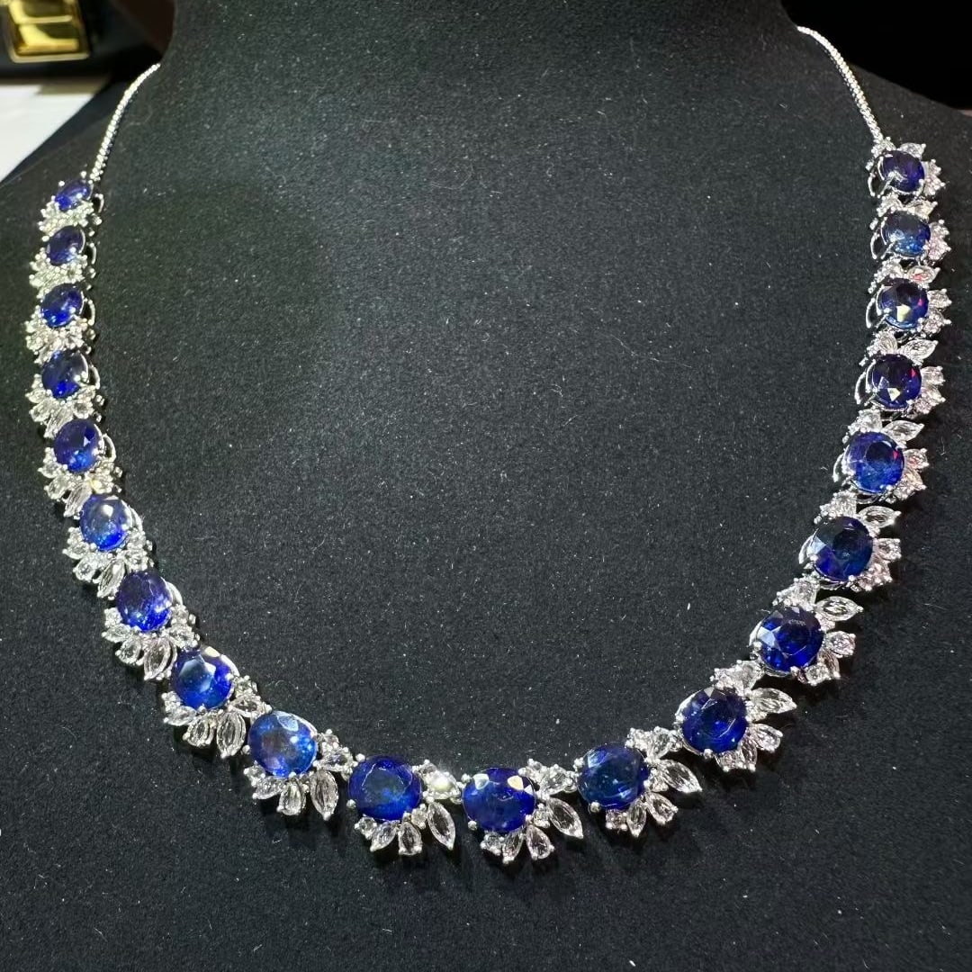 14k Gold 18.85 Ct Vivid Blue Natural Sapphire & Sapphire Necklace: Ref:231085031 // gold content:14k gold // main gemstone:sapphire // shape:oval // carat weight:18. 85ct // color:vivid blue // treatment:natural // // adjacent gemstone 2 : sapphire // shape:multiple 