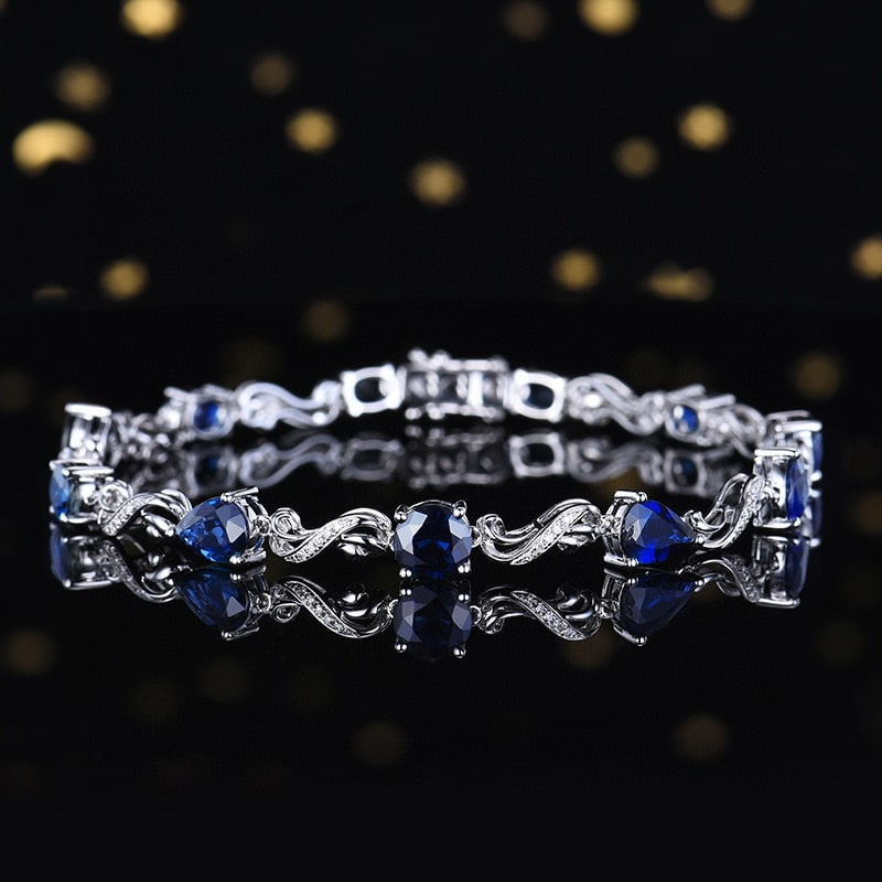 14k Gold 7.31 Ctw Natural Sapphire & Diamond Bracelet: Ref:231085061 // gold content:14k gold // main gemstone:sapphire // shape:multiple // carat weight:7. 18ct // color:blue // treatment:natural // // adjacent gemstone 2 : diamond // number of