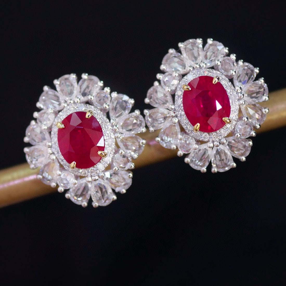 14k Gold 1.64 Ctw Natural Ruby & Diamond Earrings: Ref:231085069 // gold content:14k gold // main gemstone:ruby // shape:oval // carat weight:1. 58ct // color:red // treatment:natural // // adjacent gemstone 2 : diamond // shape:round // carat weight: