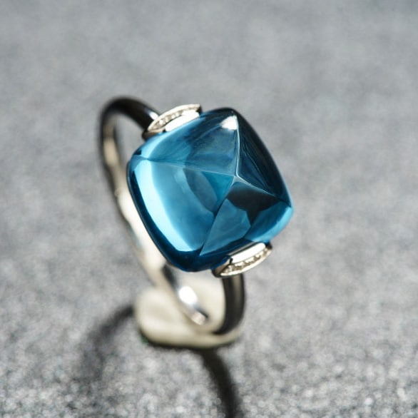 14k Gold 8.29 Ct Natural Topaz & Diamond Ring: Ref:231085082 // gold content:14k gold // ring size:7. 25us // // main gemstone:topaz // shape:sugar-loaf // carat weight:8. 29ct // color:blue // treatment:natural // // adjacent gemstone 2 :