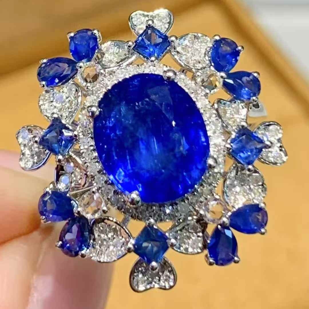 14k Gold 3 Ct Vivid Blue Natural Sapphire & Diamond Ring: Ref:231085109 // gold content:14k gold // ring size:7. 25us // // main gemstone:sapphire // shape:oval // carat weight:3ct // color:vivid blue // treatment:natural // // adjacent gemstone 2 : diamond