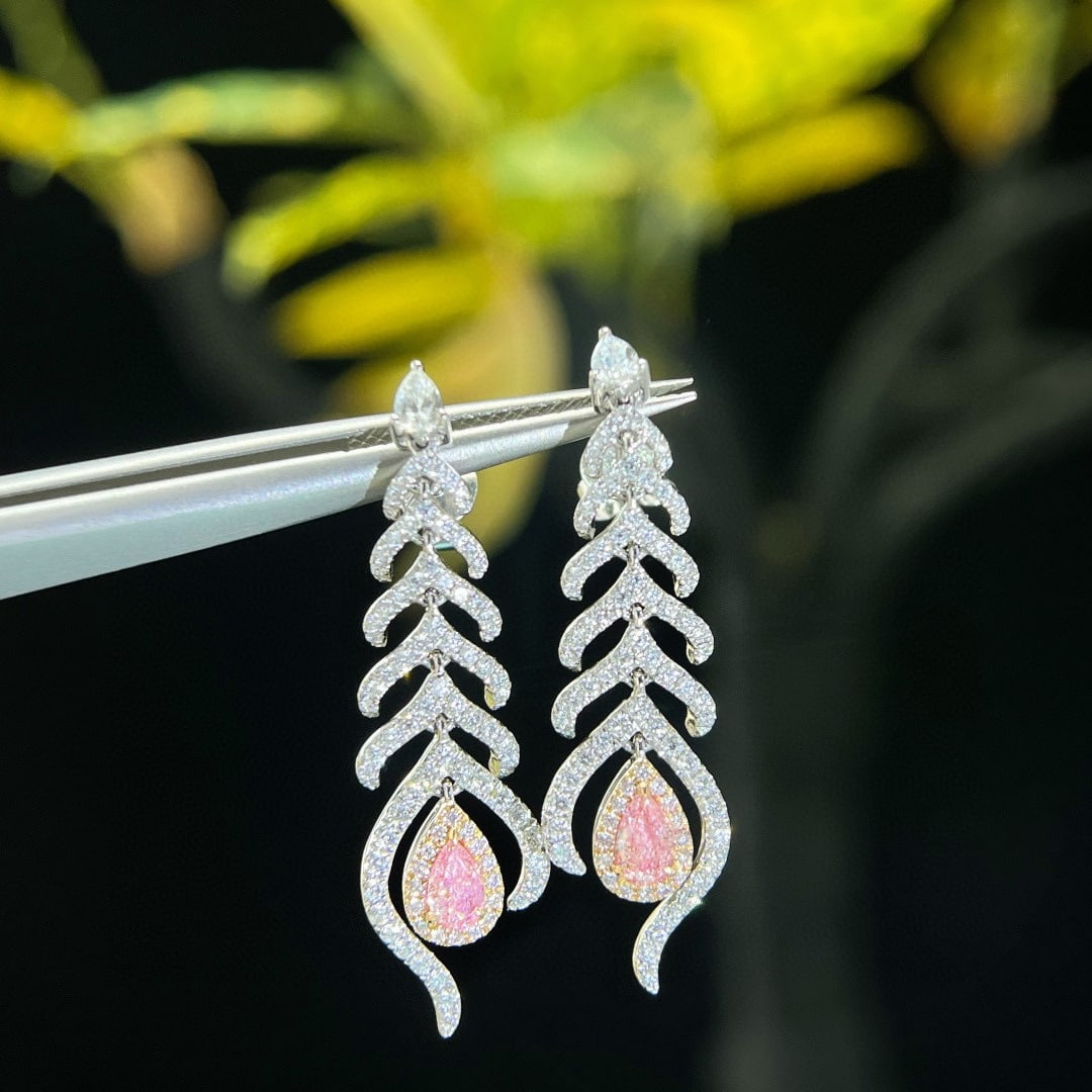 14k Gold 1.28 Ctw Natural Pink Diamond & Diamond Earrings: Ref:231085115 // gold content:14k gold // main gemstone:pink diamond // shape:pear // carat weight:0. 36ct // color:pink // treatment:natural // // adjacent gemstone 2 : diamond // shape:multiple // c