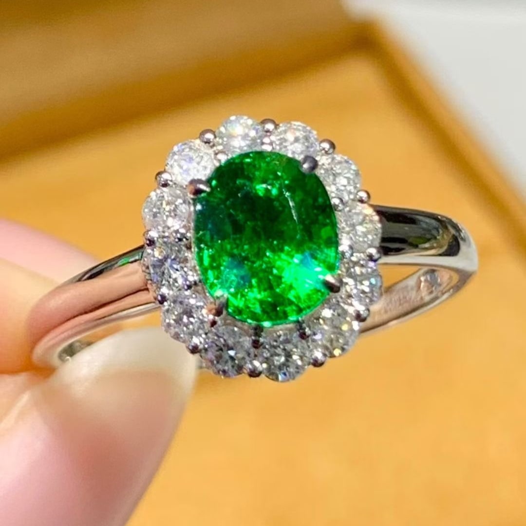 14k Gold 1.2 Ct Vivid Green Natural Tsavorite & Diamond Ring: Ref:231085133 // gold content:14k gold // ring size:7. 25us // // main gemstone:tsavorite // shape:oval // carat weight:1. 2ct // color:vivid green // treatment:natural // // adjacent gemstone 2 :
