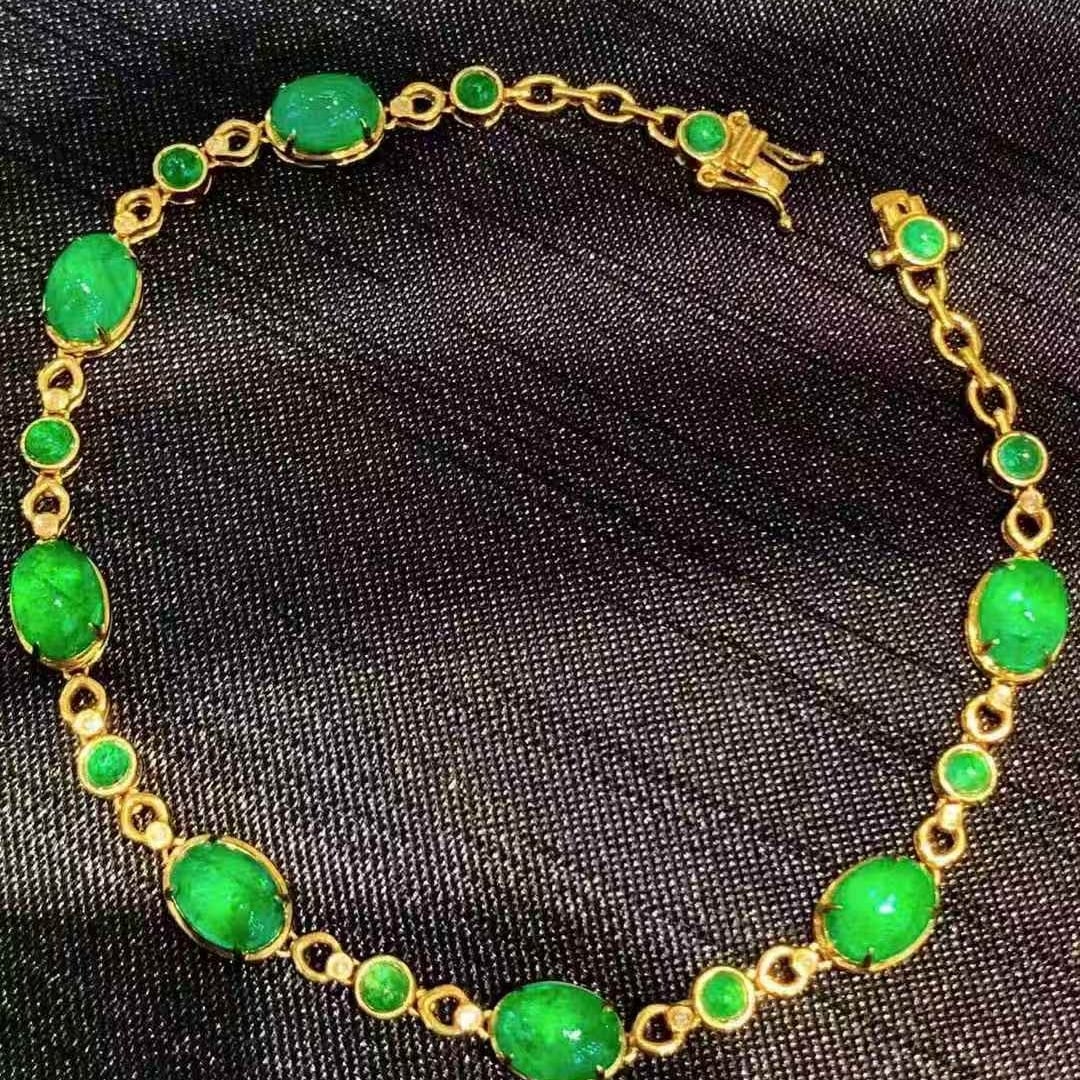 14k Gold 10.5 Ct Vivid Green Natural Emerald & Diamond Bracelet: Ref:231085150 // gold content:14k gold // main gemstone:emerald // shape:oval // carat weight:10. 5ct // color:vivid green // treatment:natural // // adjacent gemstone 2 : diamond // shape:round // cl