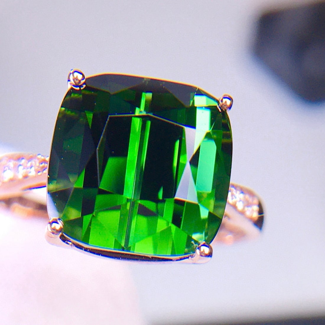 14k Gold 6.2 Ct Natural Tourmaline & Diamond Ring: Ref:231085172 // gold content:14k gold // ring size:7. 25us // // main gemstone:tourmaline // shape:cushion // carat weight:6. 2ct // color:green // treatment:natural // // adjacent gemstone 2 :