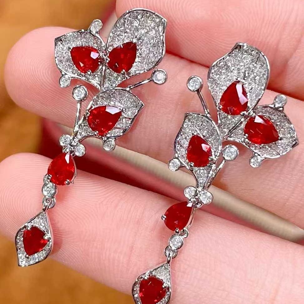 14k Gold 2.1 Ct Natural Ruby & Diamond Earrings: Ref:231085187 // gold content:14k gold // main gemstone:ruby // shape:pear // carat weight:2. 1ct // color:pigeonblood red // treatment:natural // // adjacent gemstone 2 : diamond // number of stones: