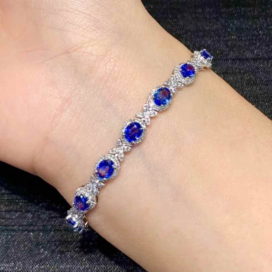 14k Gold 6.6 Ct Natural Sapphire & Diamond Bracelet: Ref:231085191 // gold content:14k gold // main gemstone:sapphire // shape:oval // carat weight:6. 6ct // color:blue // treatment:natural // // adjacent gemstone 2 : diamond // shape:round // clarity