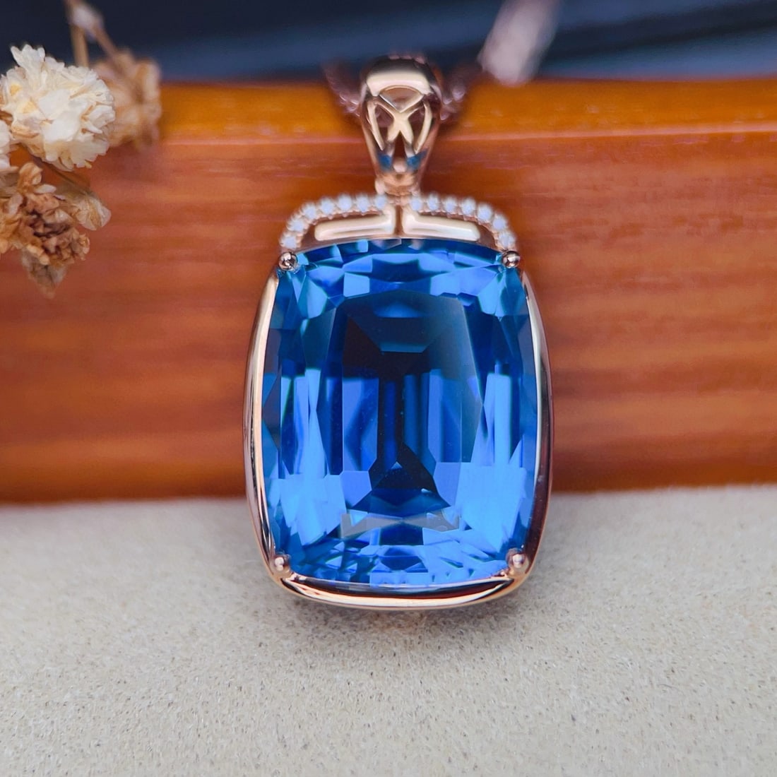 14k Gold 9.34 Ctw Natural Topaz & Diamond Pendant( Without Chain ): Ref:231085206 // gold content:14k gold // main gemstone:topaz // shape:cushion // carat weight:9. 3ct // color:blue // treatment:natural // // adjacent gemstone 2 : diamond // number of stones:14 //