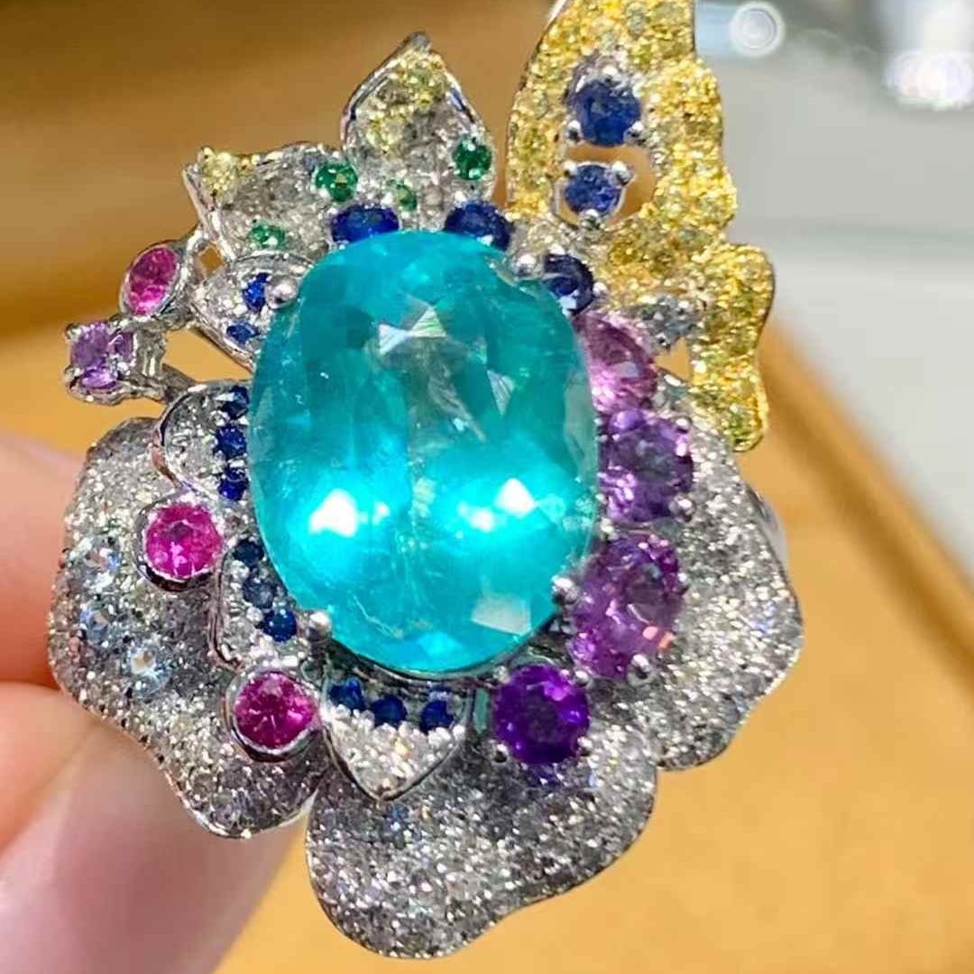 14k Gold 3.02 Ct Natural Paraiba Tourmaline & Diamond Ring: Ref:231085219 // gold content:14k gold // ring size:7. 25us // // main gemstone:paraiba tourmaline // shape:oval // carat weight:3. 02ct // color:blue // treatment:natural // // adjacent gemstone 2 :