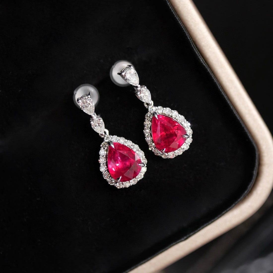 14k Gold 1.84 Ctw Natural Ruby & Diamond Earrings: Ref:231085233 // gold content:14k gold // main gemstone:ruby // shape:pear // carat weight:1. 50ct // color:red // treatment:natural // // adjacent gemstone 2 : diamond // shape:round // carat weight: