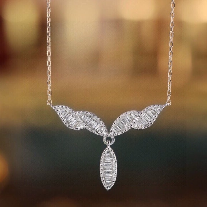14k Gold 0.3 Ct Natural H Diamond Necklace: Ref:231085242 // gold content:14k gold // main gemstone:diamond // shape:baguette // carat weight:0. 3ct // clarity grade:vs-si // color:h // treatment:natural // Condition: New Low Estimate: 1700.00