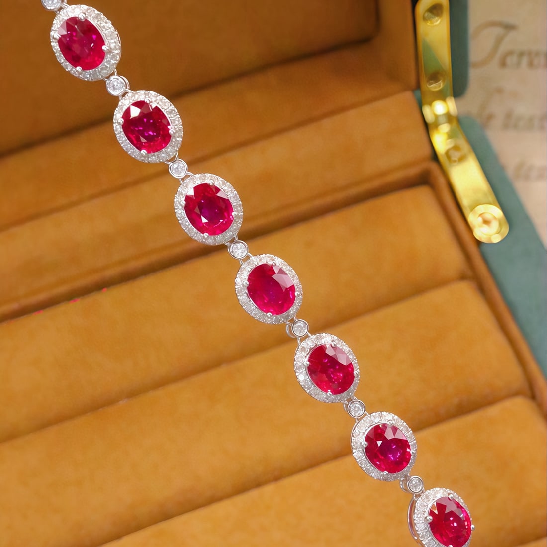 14k Gold 4.60 Ctw Vivid Red Natural Ruby & Diamond Bracelet: Ref:231086078 // gold content:14k gold // main gemstone:ruby // shape:oval // carat weight:3. 86ct // color:vivid red // treatment:natural // // adjacent gemstone 2 : diamond // number of stones:141 /