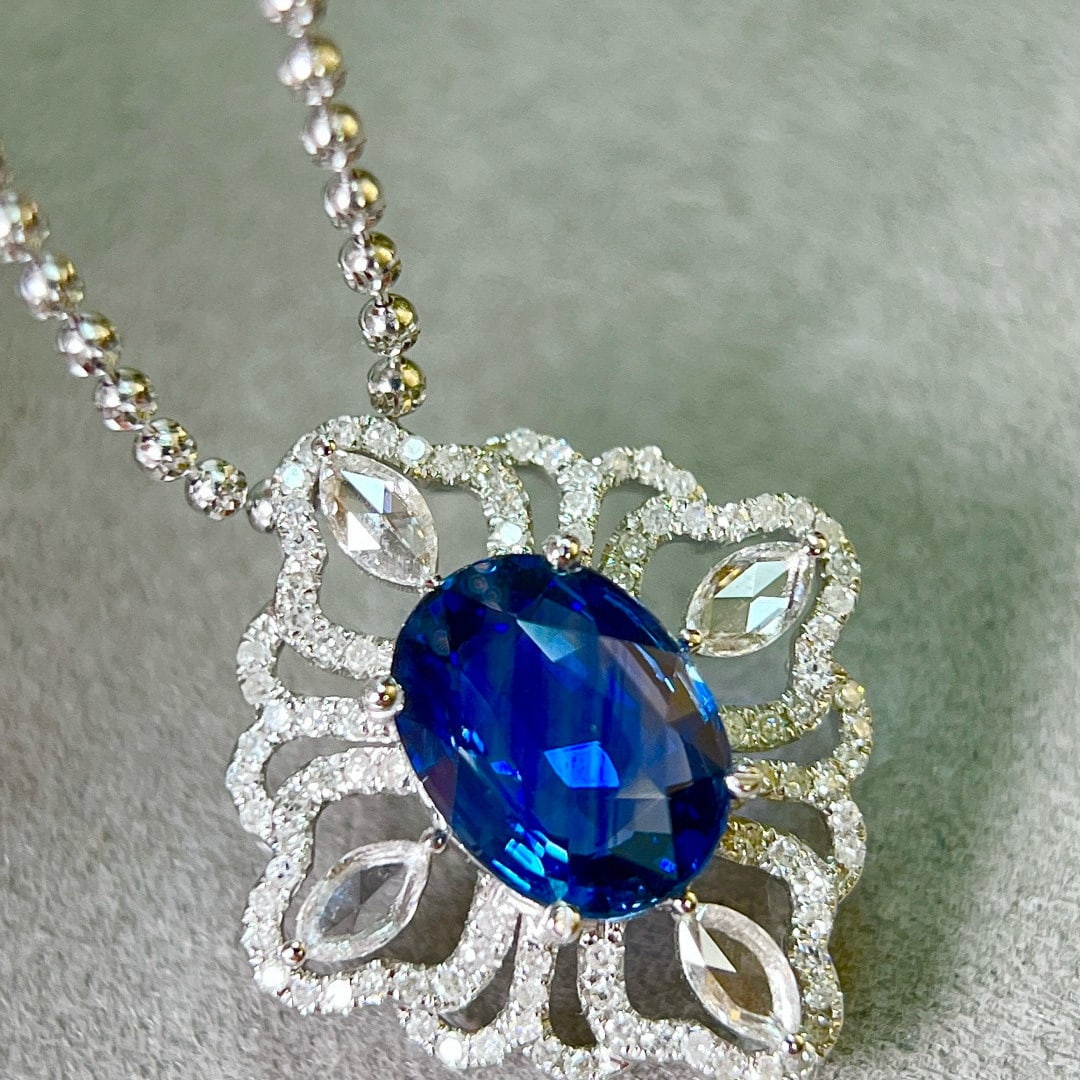 14k Gold 2.63 Ctw Vivid Blue Natural Sapphire & Diamond Pendant( Without Chain ): Ref:231086122 // gold content:14k gold // main gemstone:sapphire // shape:oval // carat weight:2. 12ct // color:vivid blue // treatment:natural // // adjacent gemstone 2 : diamond // shape:round //