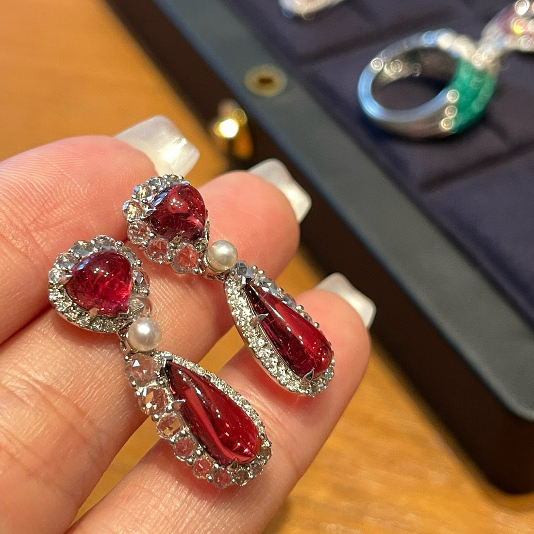 14k Gold 4.6 Ct Natural Tourmaline & Diamond & Sapphire Earrings: Ref:231086186 // gold content:14k gold // main gemstone:tourmaline // shape:pear // carat weight:4. 6ct // color:red // treatment:natural // // adjacent gemstone 2 : diamond // shape:round // clarity