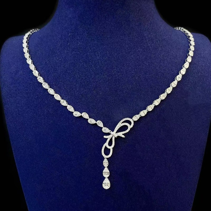 14k Gold 1.5 Ct Natural H Diamond Necklace: Ref:231087001 // gold content:14k gold // main gemstone:diamond // shape:multiple // carat weight:1. 5ct // clarity grade:vs-si // color:h // treatment:natural // Condition: New Low Estimate: 9500.00