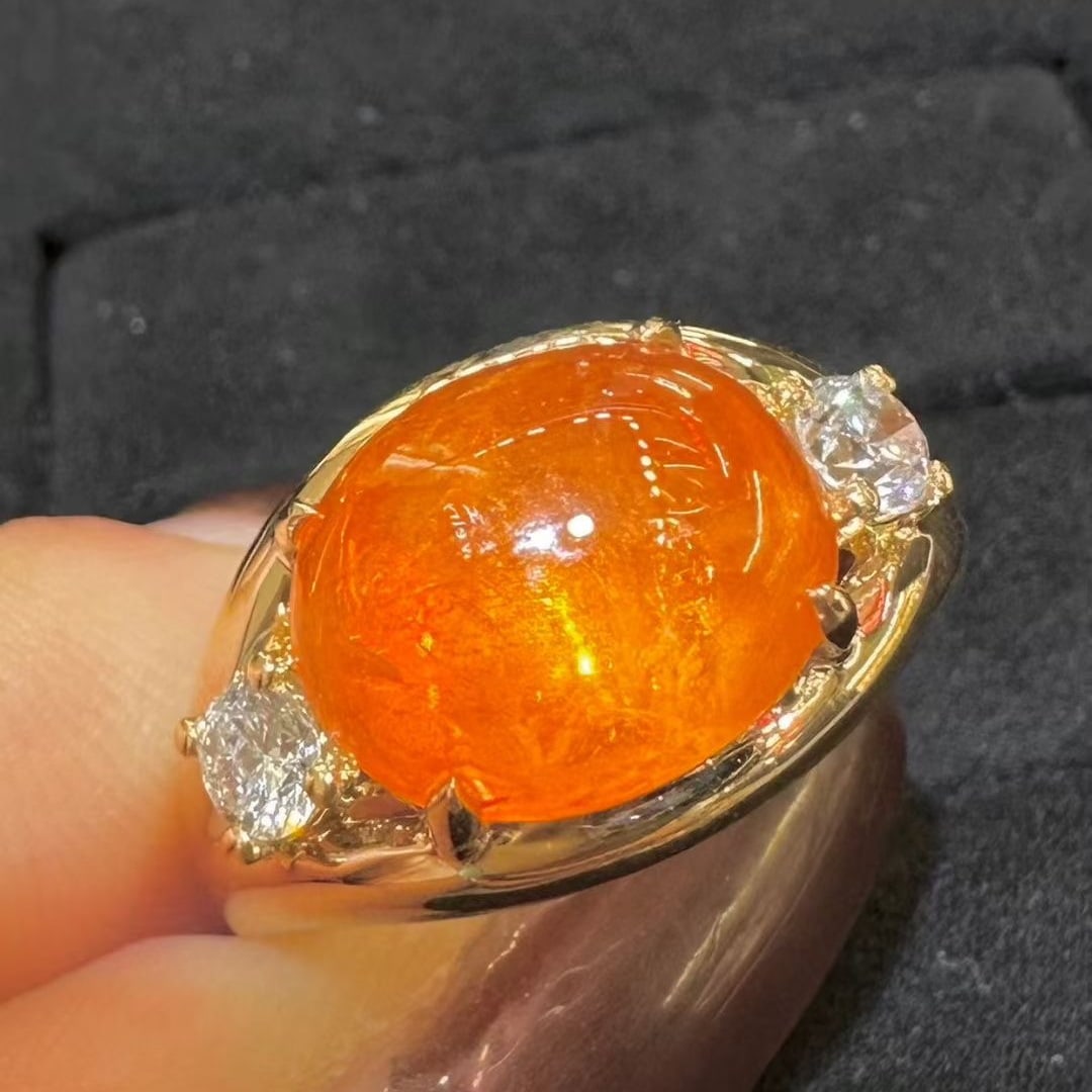 14k Gold 8.16 Ctw Natural Spessartine & Diamond Ring: Ref:231087047 // gold content:14k gold // ring size:7. 25 us // // main gemstone:spessartine // shape:oval // carat weight:7. 84ct // color:orange // treatment:natural // // adjacent gemstone 2 :
