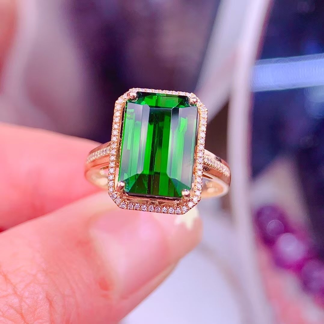 14k Gold 7.5 Ct Natural Tourmaline & Diamond Ring: Ref:231087091 // gold content:14k gold // ring size:7. 25 us // // main gemstone:tourmaline // shape:octagonal // carat weight:7. 5ct // color:green // treatment:natural // // adjacent gemstone 2 :