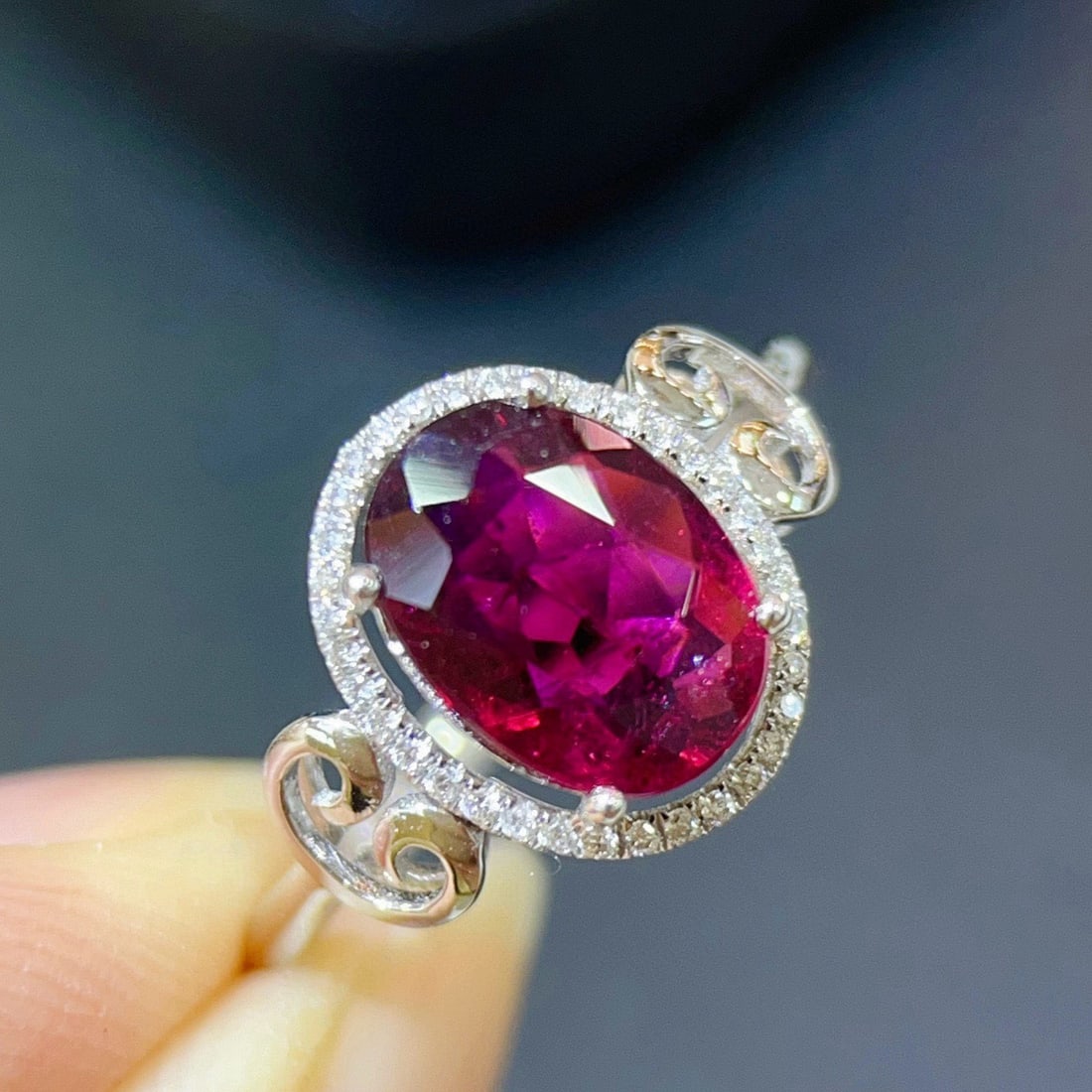 14k Gold 1.74 Ctw Natural Tourmaline & Diamond Ring: Ref:231087210 // gold content:14k gold // ring size:7. 25 us // // main gemstone:tourmaline // shape:oval // carat weight:1. 65ct // color:red // treatment:natural // // adjacent gemstone 2 : diamond