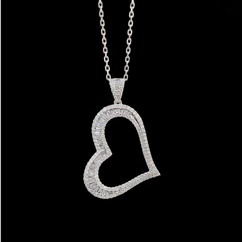 14k Gold 0.7 Ct Natural H Diamond Pendant( Without Chain ): Ref:231087223 // gold content:14k gold // main gemstone:diamond // shape:multiple // carat weight:0. 7ct // clarity grade:vs-si // color:h // treatment:natural // Condition: New Low Estimate: 2900.00