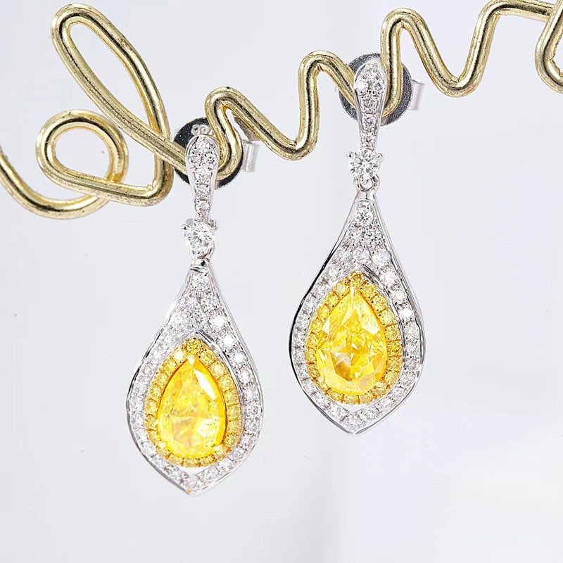 14k Gold 1.47 Ctw Natural Yellow Diamond & Diamond Earrings: Ref:231087225 // gold content:14k gold // main gemstone:yellow diamond // shape:pear // carat weight:1ct // color:yellow // treatment:natural // // adjacent gemstone 2 : diamond // shape:round // cara