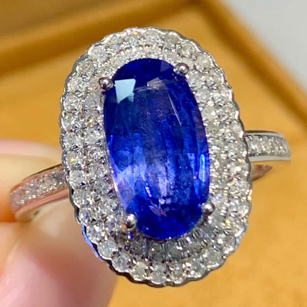14k Gold 2.9 Ct Natural Sapphire & Diamond Ring: Ref:231087234 // gold content:14k gold // ring size:7. 25 us // // main gemstone:sapphire // shape:oval // carat weight:2. 9ct // color:blue // treatment:natural // // adjacent gemstone 2 : diamond