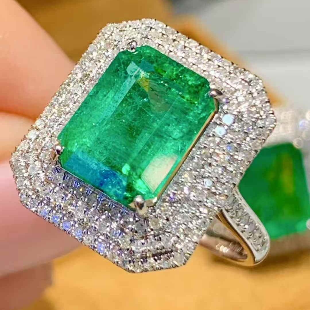 14k Gold 6.9 Ct Natural Emerald & Diamond Ring: Ref:231087239 // gold content:14k gold // ring size:7. 25 us // // main gemstone:emerald // shape:octagonal // carat weight:6. 9ct // color:green // treatment:natural // // adjacent gemstone 2 :