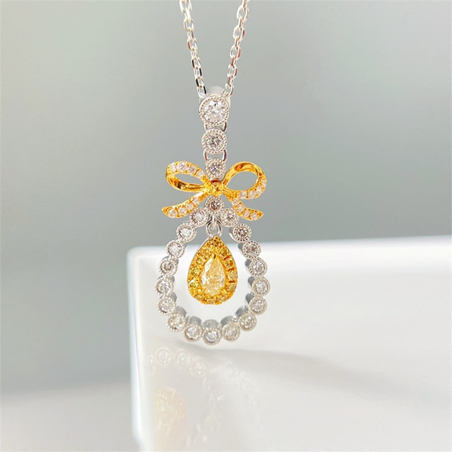 14k Gold 0.50 Ctw Natural Yellow Diamond & Diamond Necklace: Ref:231088009 // gold content:14k gold // main gemstone:yellow diamond // shape:pear // carat weight:0. 40ct // color:yellow // treatment:natural // // adjacent gemstone 2 : diamond // shape:round //