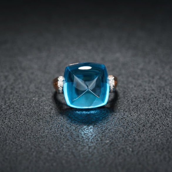 14k Gold 18.26 Ct Natural Topaz & Diamond Ring: Ref:231088020 // gold content:14k gold // ring size:7. 25us // // main gemstone:topaz // shape:sugar-loaf // carat weight:18. 26ct // color:blue // treatment:natural // // adjacent gemstone 2 :