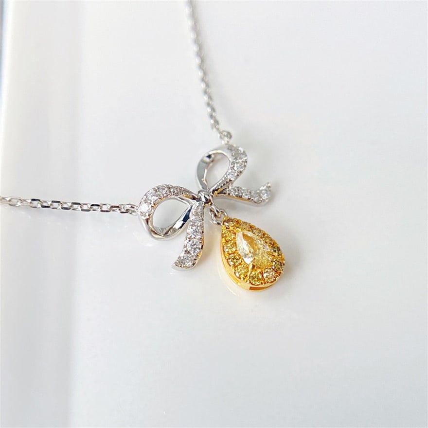 14k Gold 0.20 Ctw Natural Yellow Diamond & Diamond Necklace: Ref:231088025 // gold content:14k gold // main gemstone:yellow diamond // shape:pear // carat weight:0. 10ct // color:yellow // treatment:natural // // adjacent gemstone 2 : diamond // shape:round //