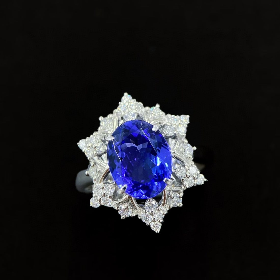 14k Gold 2.97 Ctw Natural Tanzanite & Diamond Ring: Ref:231088030 // gold content:14k gold // ring size:7. 25us // // main gemstone:tanzanite // shape:oval // carat weight:2. 58ct // color:blue // treatment:natural // // adjacent gemstone 2 : diamond
