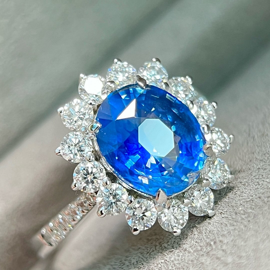 14k Gold 3.48 Ctw Natural Sapphire & Lab Grown Diamond Ring: Ref:231088034 // gold content:14k gold // ring size:7. 25us // // main gemstone:sapphire // shape:oval // carat weight:2. 45ct // color:cornflower blue // treatment:natural // // adjacent gemstone 2 :