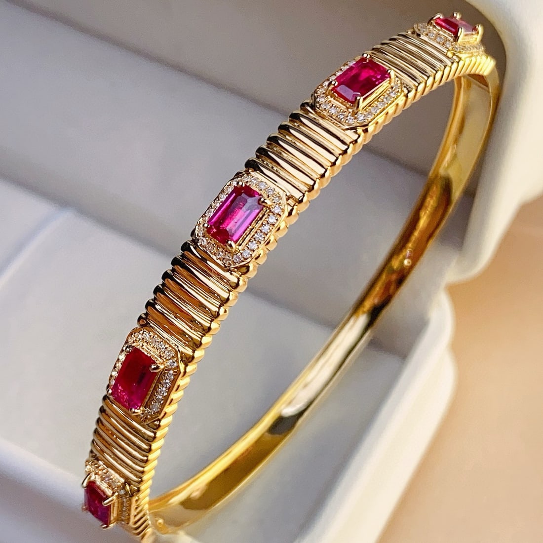 14k Gold 2.48 Ct Natural Ruby & Diamond Bangle: Ref:231088082 // gold content:14k gold // main gemstone:ruby // shape:octagonal // carat weight:2. 48ct // color:red // treatment:natural // // adjacent gemstone 2 : diamond // number of stones:115