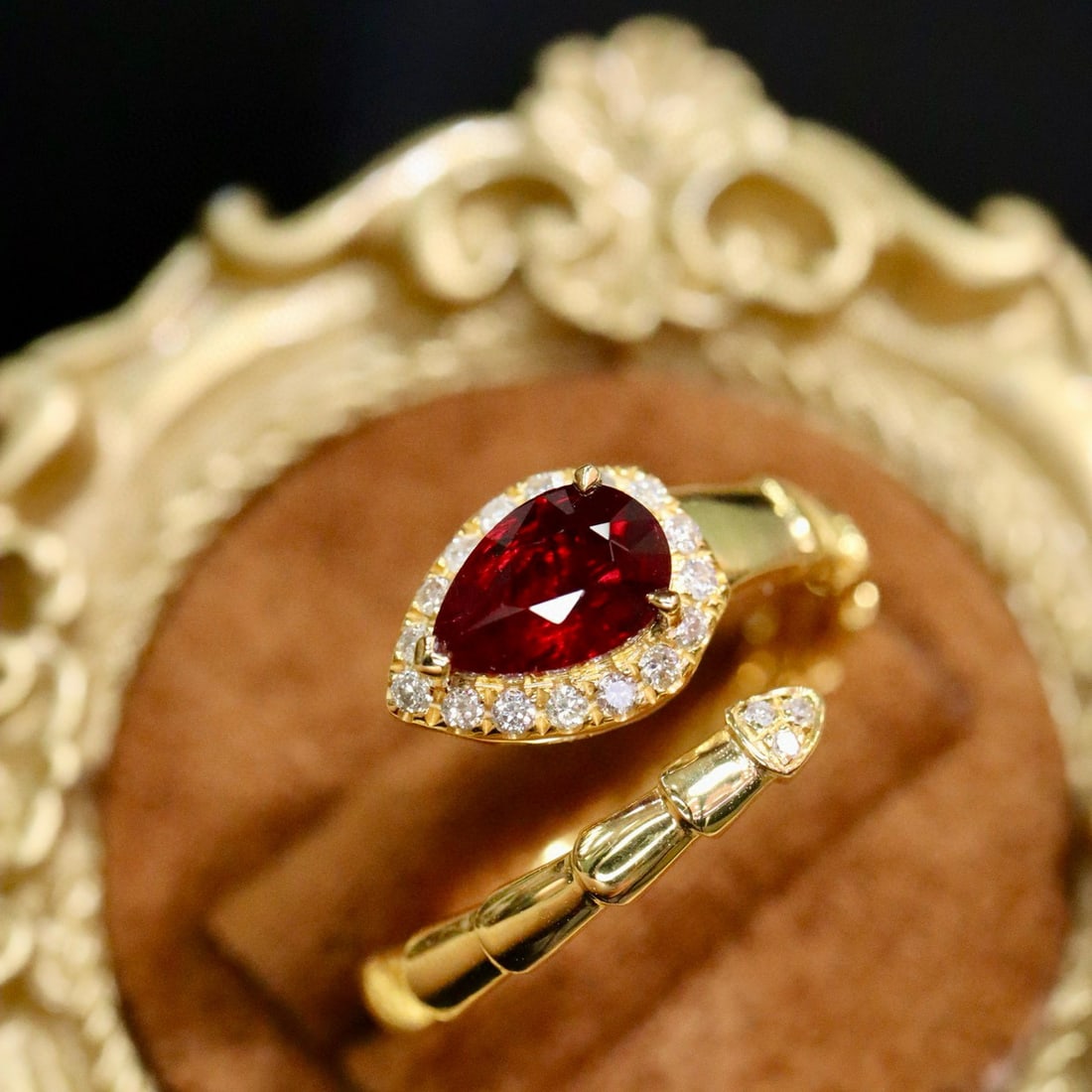 14k Gold 1.04 Ctw Natural Ruby & Diamond Ring: Ref:231088102 // gold content:14k gold // ring size:7. 25us // // main gemstone:ruby // shape:pear // carat weight:0. 90ct // color:red // treatment:natural // // adjacent gemstone 2 : diamond //