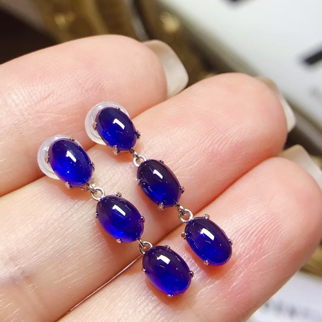 14k Gold 4.5 Ct Natural Sapphire Earrings: Ref:231088165 // gold content:14k gold // main gemstone:sapphire // shape:oval // carat weight:4. 5ct // color:royal blue // treatment:natural // Condition: New Low Estimate: 6400.00 High Estimate: