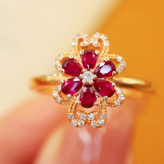14k Gold 0.43 Ctw Natural Ruby & Diamond Ring: Ref:231088167 // gold content:14k gold // ring size:7. 25us // // main gemstone:ruby // shape:pear // carat weight:0. 34ct // color:red // treatment:natural // // adjacent gemstone 2 : diamond //