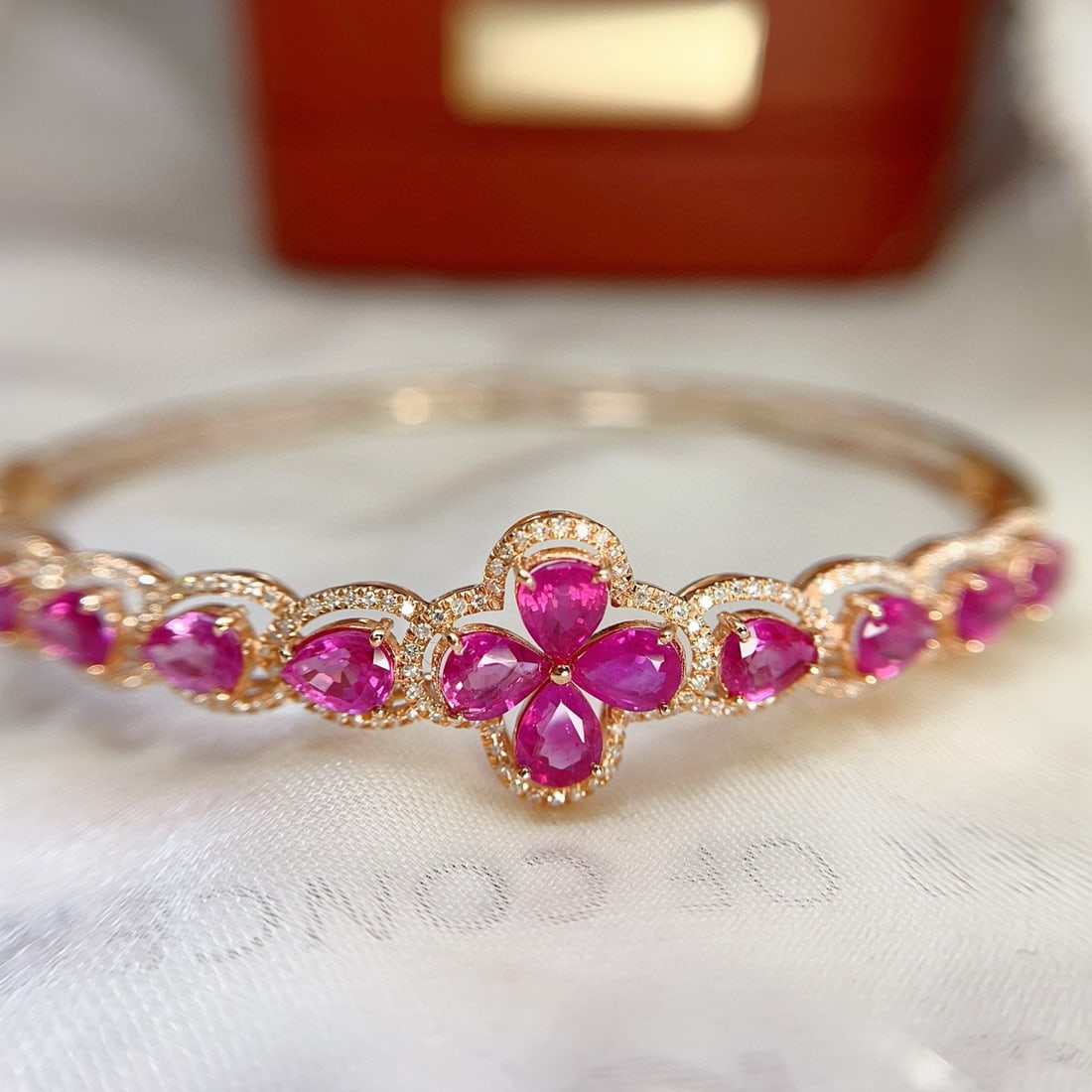 14k Gold 6.30 Ct Natural Ruby & Diamond Bangle: Ref:231088207 // gold content:14k gold // main gemstone:ruby // shape:pear // carat weight:6. 30ct // color:red // treatment:natural // // adjacent gemstone 2 : diamond // number of stones:196 //