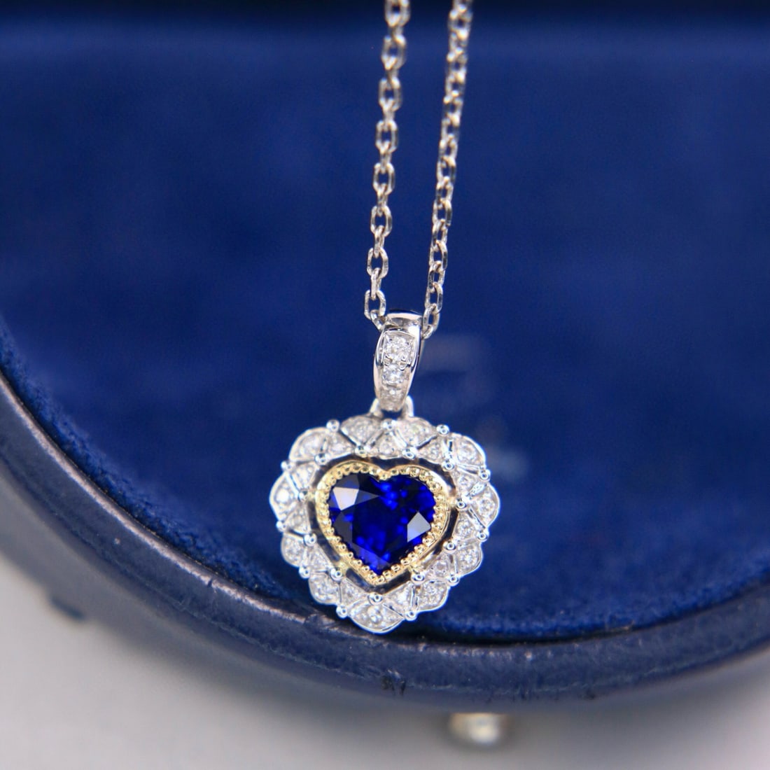 14k Gold 0.87 Ctw Natural Sapphire & Diamond Pendant( Without Chain ): Ref:231088222 // gold content:14k gold // main gemstone:sapphire // shape:heart // carat weight:0. 79ct // color:royal blue // treatment:natural // // adjacent gemstone 2 : diamond // shape:round //